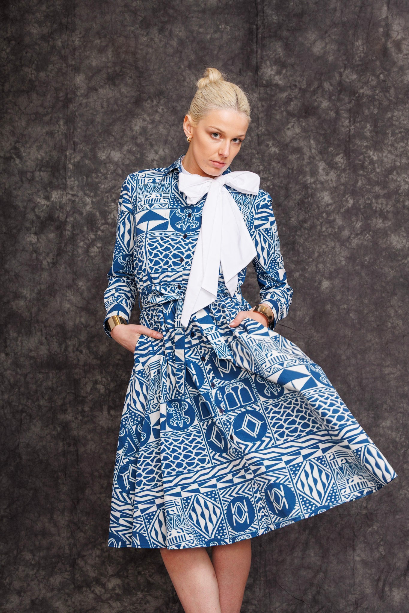 Model twirling in Fatime Shirt Dress to showcase flared silhouette