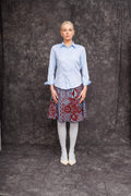 Model wearing Banja 1/2 Circle Skirt styled with button-down shirt