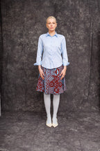 Model wearing Banja 1/2 Circle Skirt styled with button-down shirt