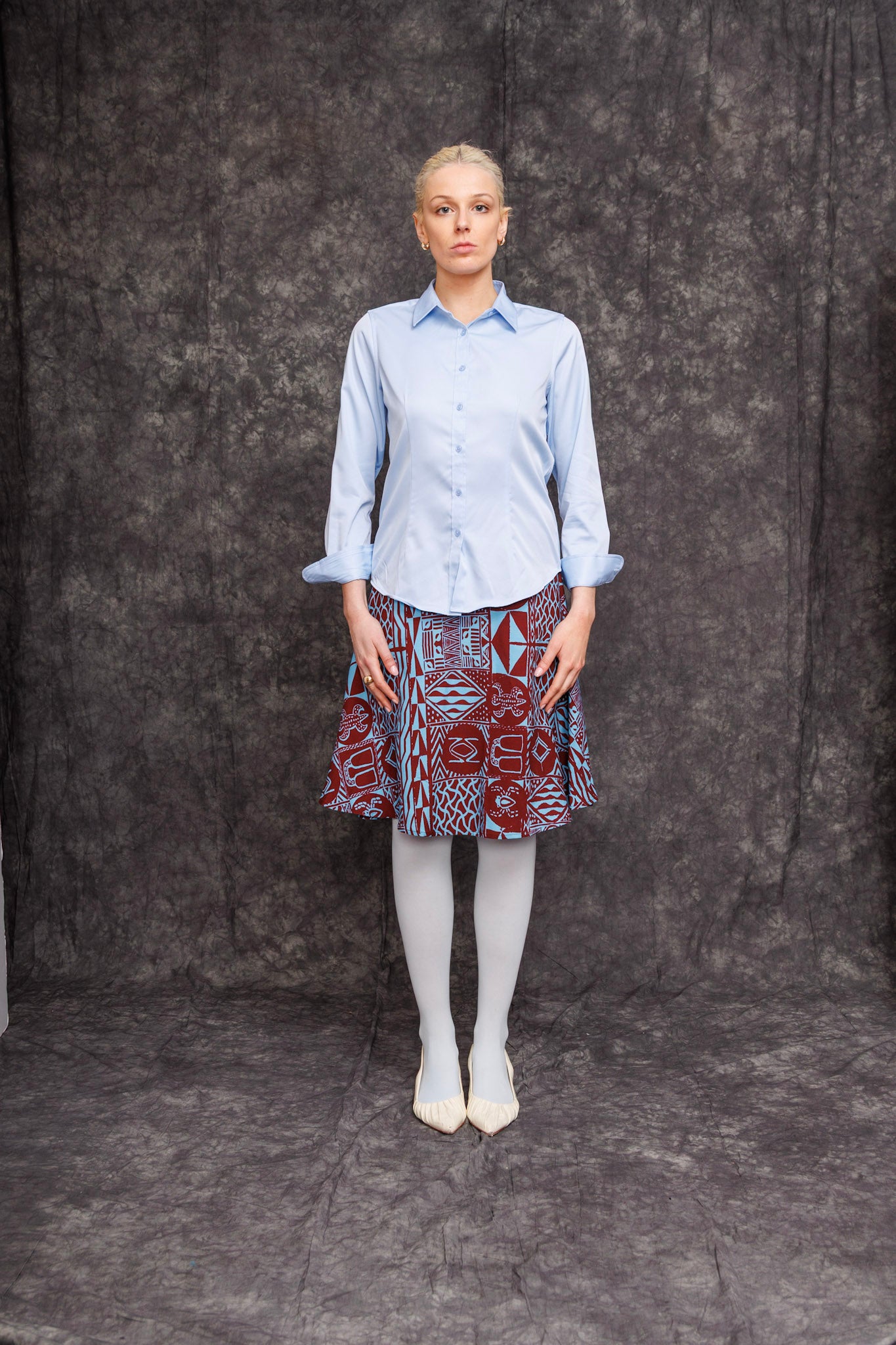 Model wearing Banja 1/2 Circle Skirt styled with button-down shirt