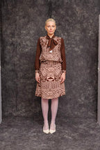 Model wearing Ngassa Circle Skirt styled with long-sleeve blouse