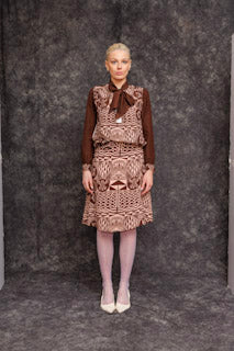 Model wearing Ngassa Circle Skirt styled with long-sleeve blouse