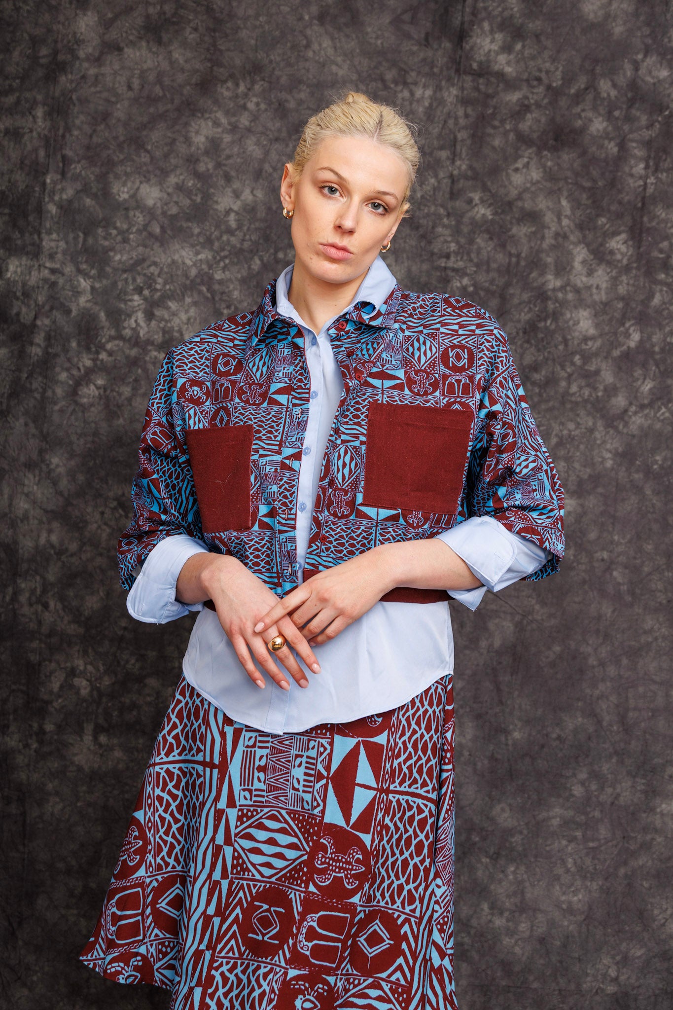 Model wearing Noumbissi Kimono Sleeve Shirt with heritage print and white collar